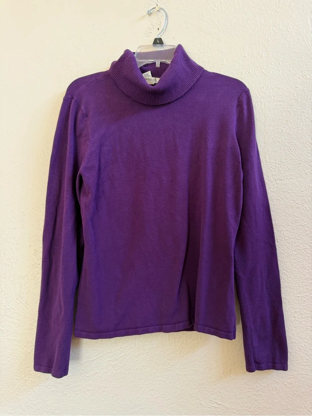 Harold’s purple turtleneck sweater